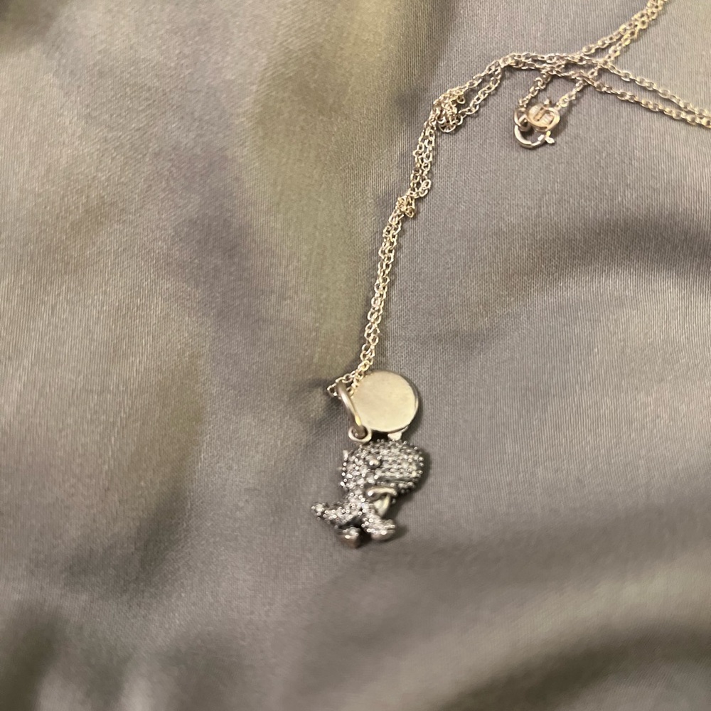 Pandora dinosaur charm like new, with 18” SS chain